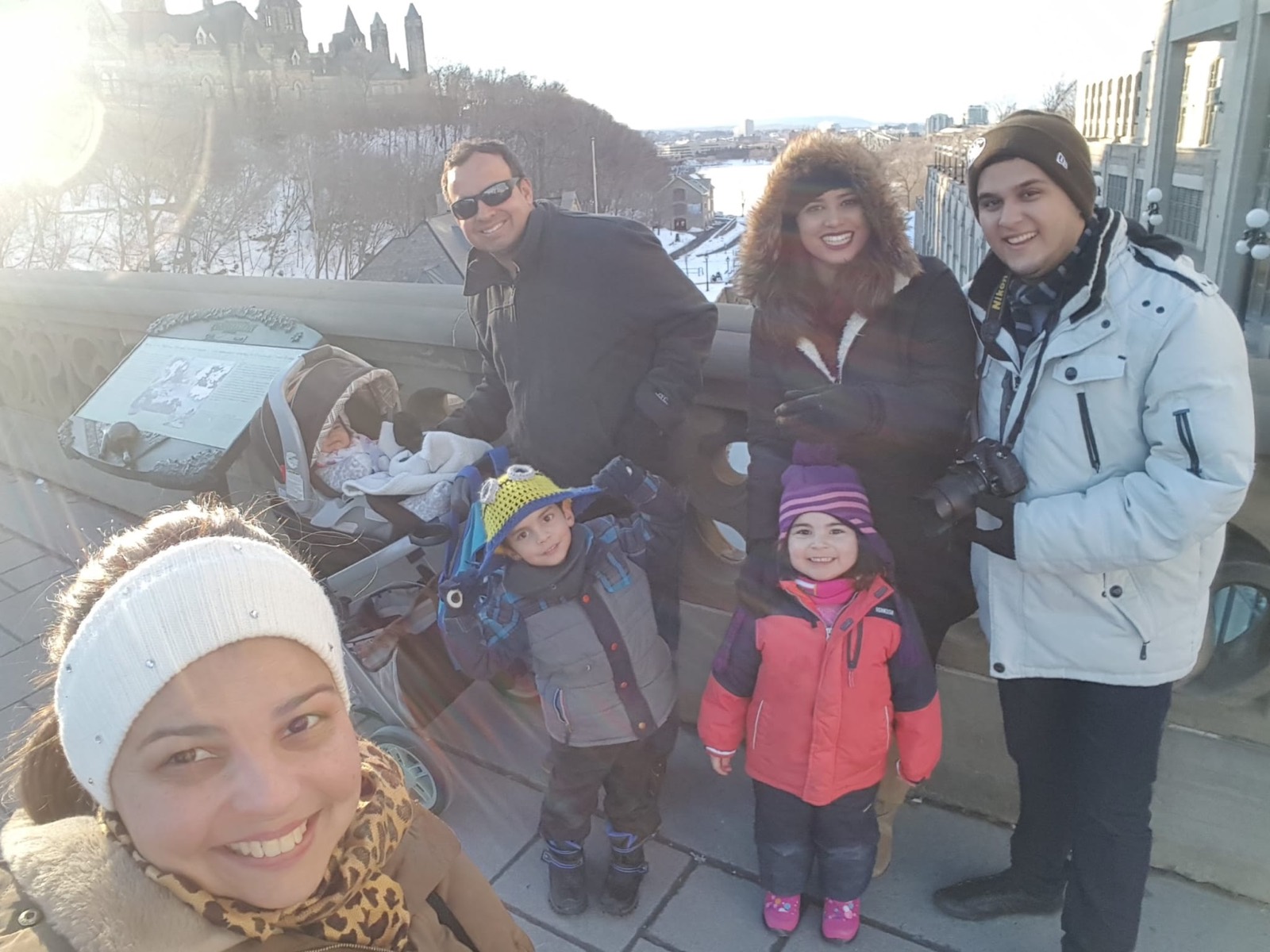 Daniel with friends in winter clothes outdoors