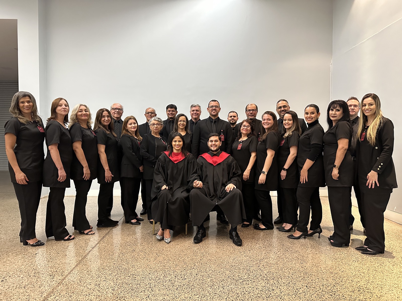 The school's staff in black uniforms